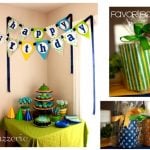 Blue, green, and yellow boy's 1st birthday party picture