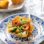 Shrimp caesar salad in parmesan cups