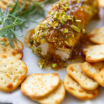 goat cheese log appetizer with fig, pistachios and honey